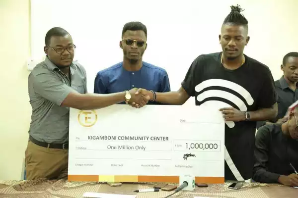 Photos: Rapper Ycee Gives N1M To Kigamboni Community As He Embarks On His African Tour